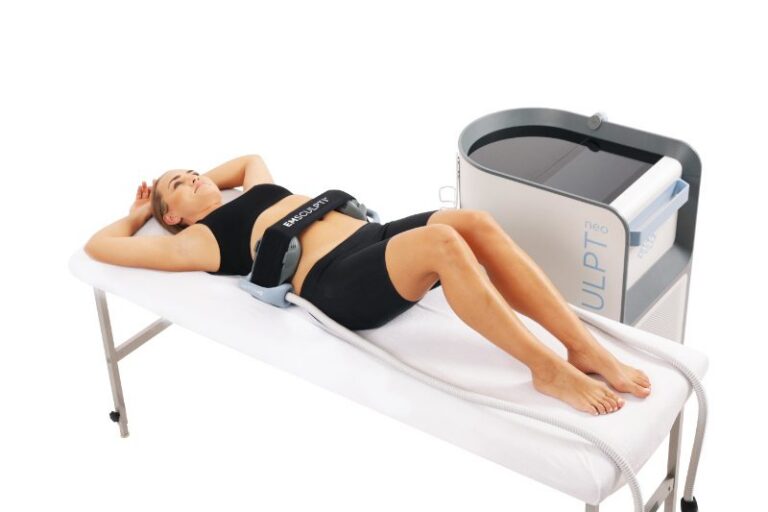 Woman receiving body sculpting treatment