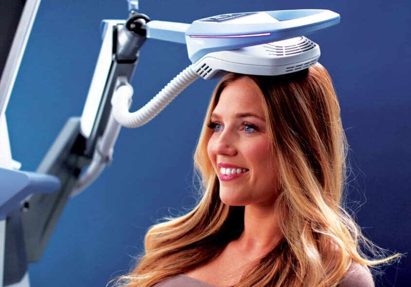 Woman using EXOMIND machine